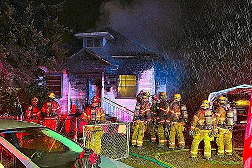 In heavy rain, firefighters from several stations in Southeast gathered on December 20th to put out a raging house fire on S.E. 69th in the Brentwood-Darlington neighborhood.