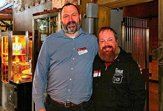 At this East Portland Chamber of Commerce Event, it’s Woodstock neighborhood Association Chair Brett Scott; and Scott Allen of Toast Restaurant, representing the Woodstock Community Business Association.