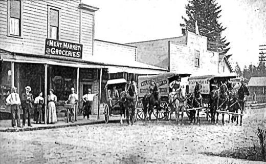 With the staff lined up for a photo, and ready for the morning shoppers, Bob Welchs Grocery Store was a big operation  three delivery wagons, a  horse-drawn buggy for smaller merchandise deliveries, and five employees standing by, ready to fill orders and help customers. Not to mention all the boys working part-time!