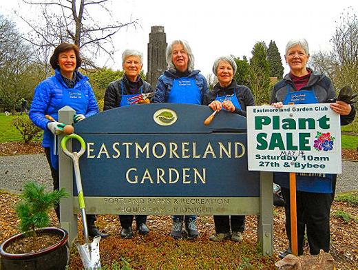 At the site of the May 14th plant sale and �Gathering at the Garden� they�re organizing, here are Eastmoreland Garden Club members � from left: Theresa Lovett, Judy Hayward, Carrie McGraw, Susan Hoover, and Marti Granmo. The conifer at lower left is an example of small trees that will be included in the plant sale.