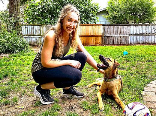 Southeast Portland apartment-dweller Marla Nixon, with her eight-month-old boxer/shepherd mix Buffy, in the Woodstock backyard owned by Amanda Hurley that she�s rented for an hour through the Sniffspot app or website. 